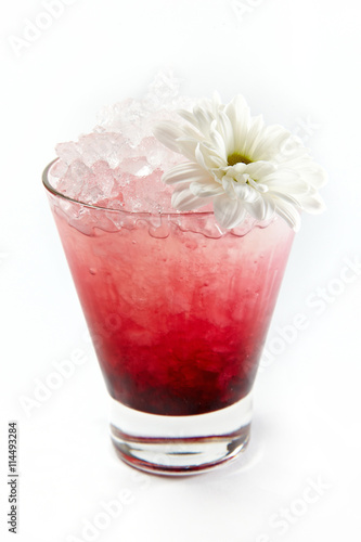 Wallpaper Mural Red berries drink with chamomile in a glass isolated on white Torontodigital.ca