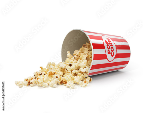 Popcorn in striped bucket on white background
