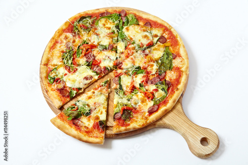 Pizza with sausages isolated on white
