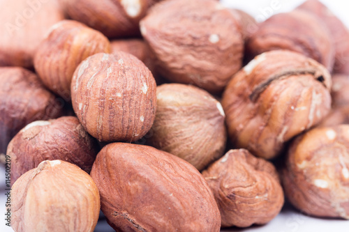Macro closeup bunch of hazelnuts