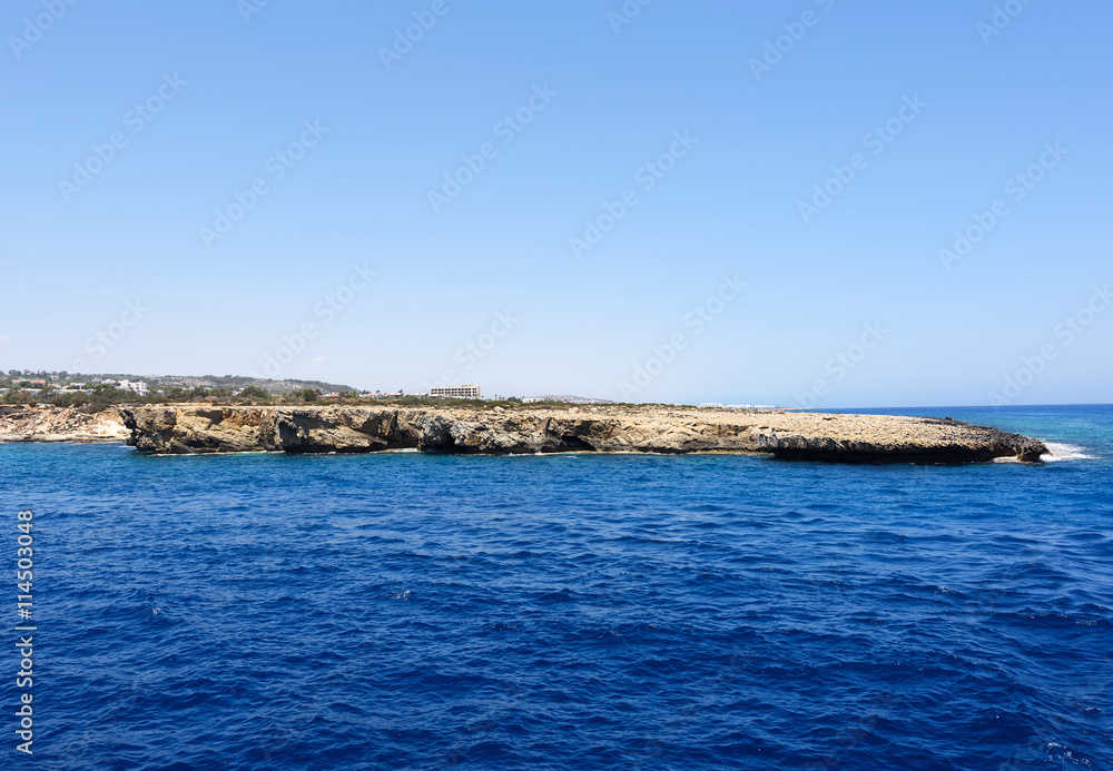 Photo of blue sea and rocks in protaras paralimni cyprus island.