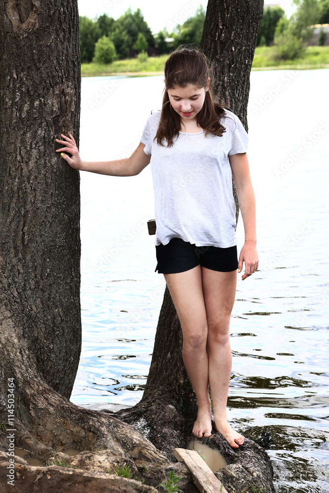 teen girls at a lake Adobe Stock