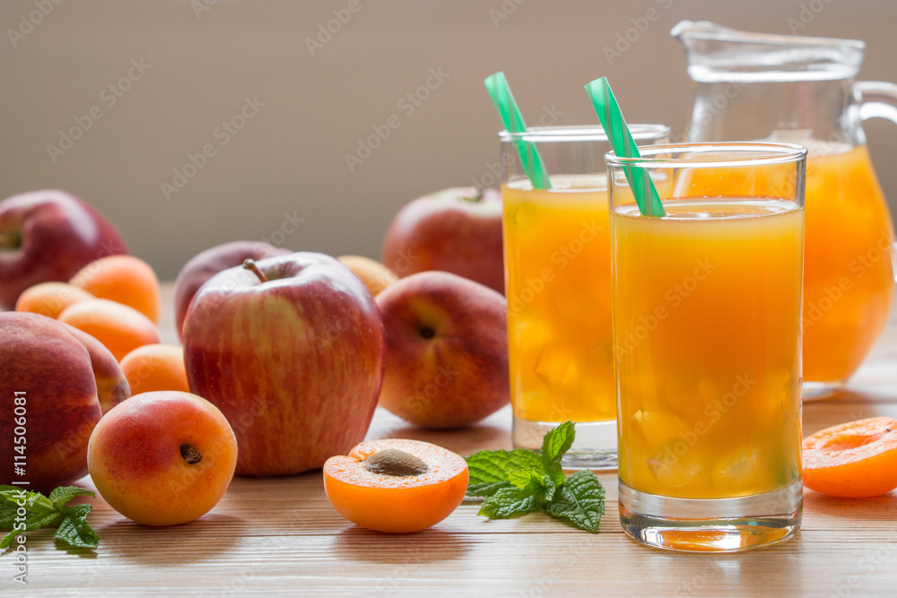 Apricot peach apple juice with ice. Apricot peach apple juice with ice.
