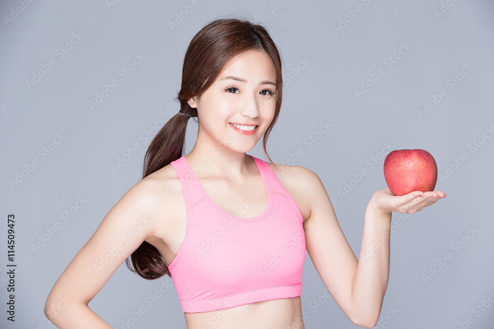 sport woman with an apple sport woman with an apple