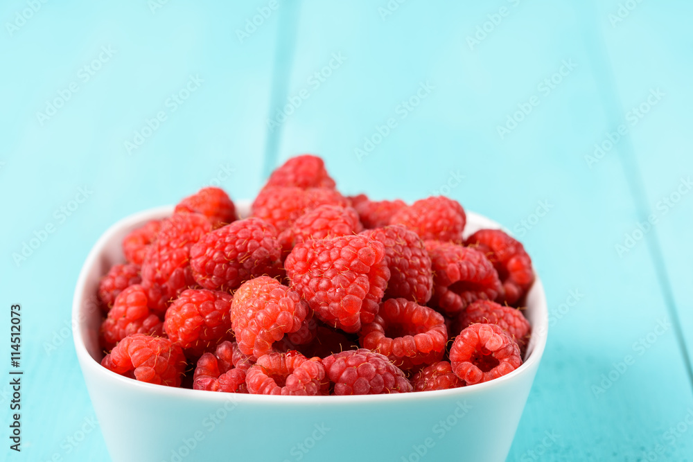 White Bowl Of Red Fresh Raspberries White Bowl Of Red Fresh Raspberries