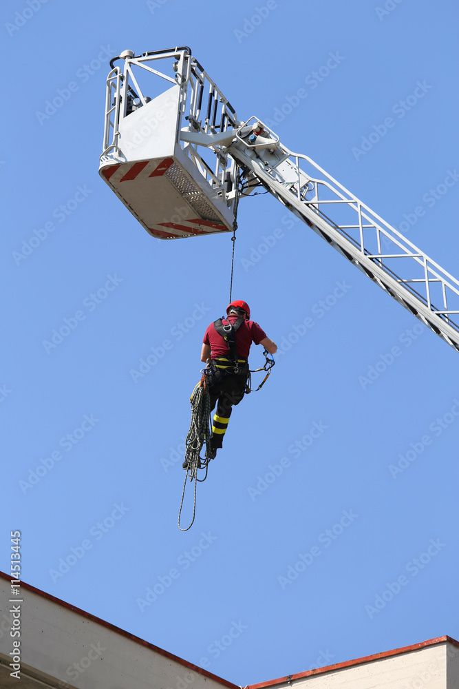 firefighter hung the rope climbing in the fire station firefighter hung the rope climbing in the fire station