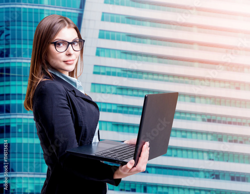 Business woman on the city background