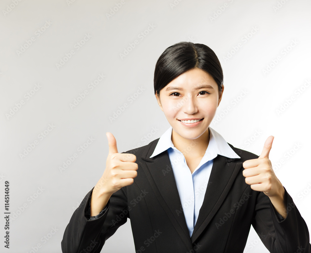 young smiling business woman with thumb up gesture young smiling business woman with thumb up gesture