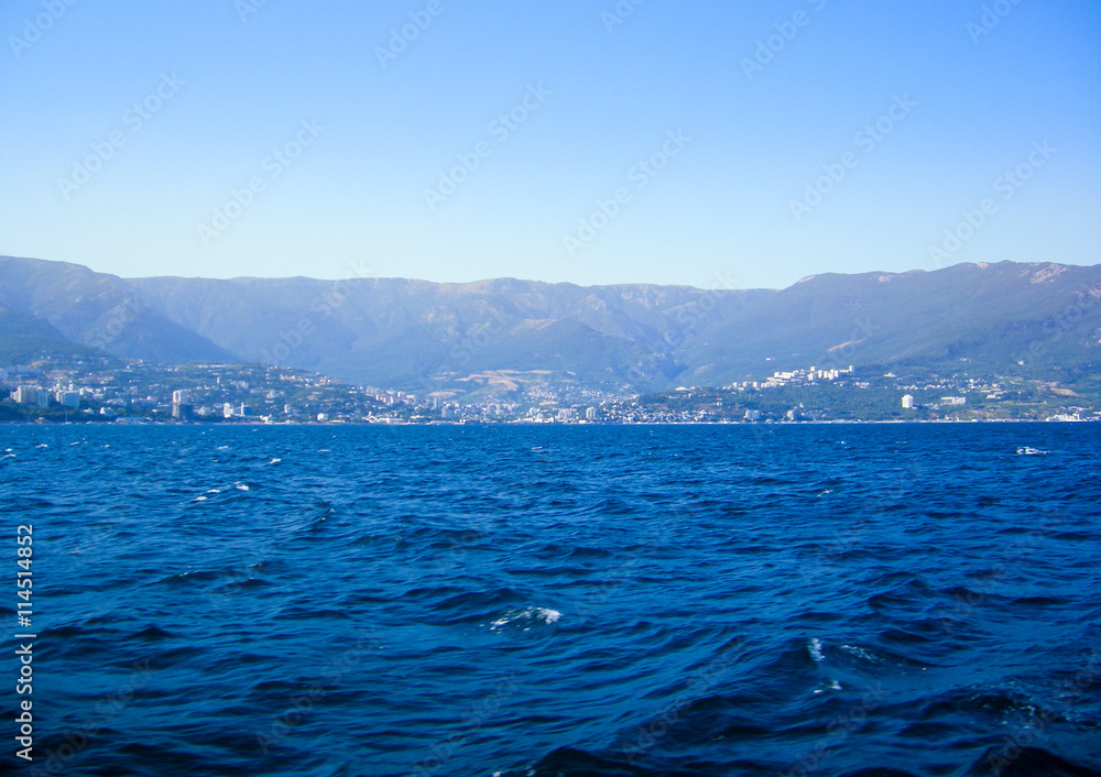 Island of Crimea. Yalta. View from the side of the sea on a hot day