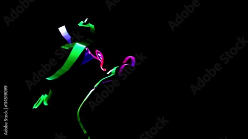 4 people dancing in costumes of LEDs 