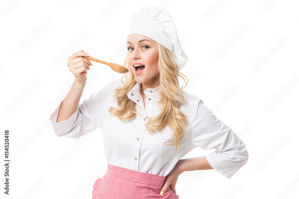 Chef woman tasting food from wooden spoon Chef woman tasting food from wooden spoon