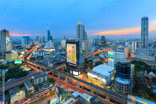 Aerial view of Bangkok modern office buildings, condominium in Bangkok city downtown with sunset sky , Bangkok , Thailand © Getty Gallery