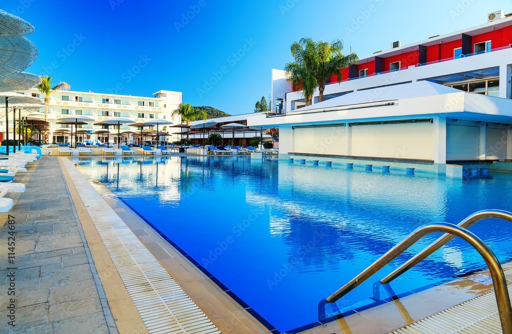 large swimming pool at the resort on the shores of the Aegean Sea Greece Rhodes