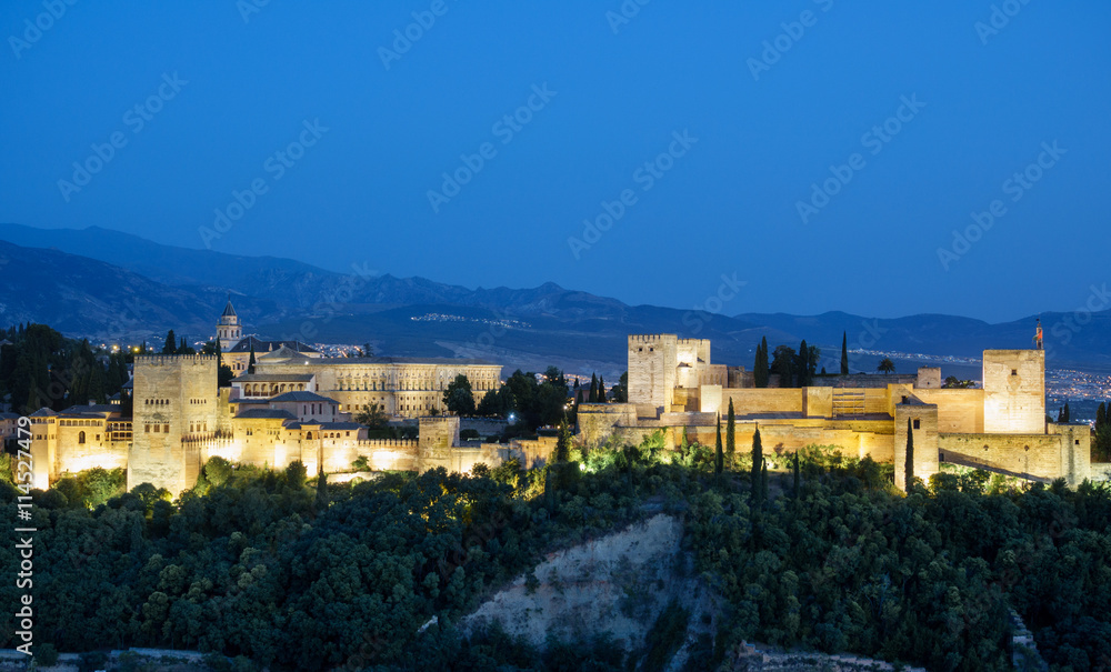 Ancient arabic fortress of Alhambra at sunset. Granada, Spain.