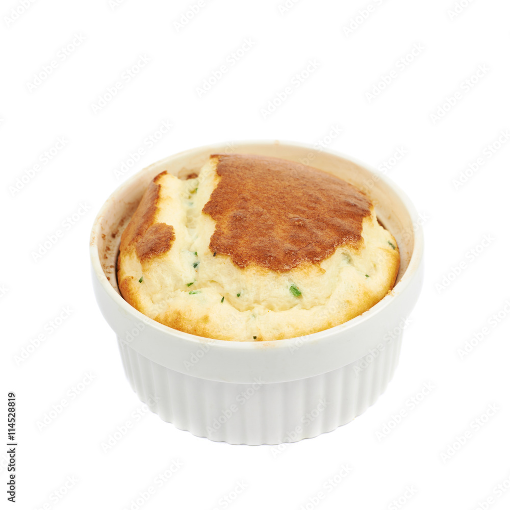 Cheese souffle in a ramekin isolated Cheese souffle in a ramekin isolated