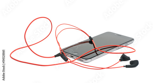 Red headphones in a smart phone isolated