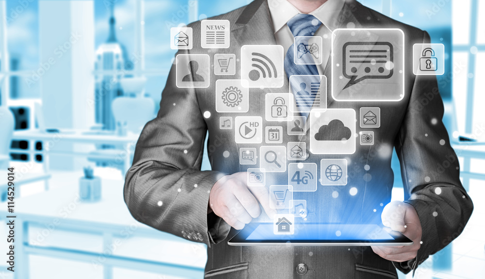 Business man using tablet PC with social media icon set Business man using tablet PC with social media icon set