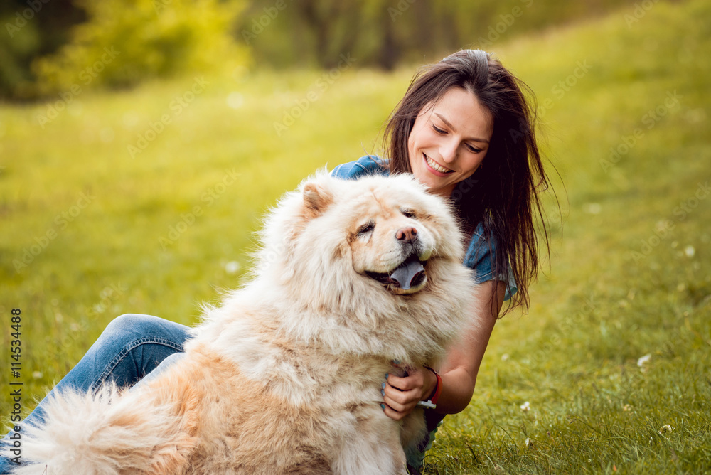 Young woman with the dogs in the park. Young woman with the dogs in the park.
