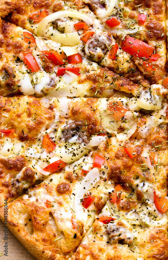 Italian pizza with sausage, red peppers and cheese mozzarella, onion, rosemary and basil Italian pizza with sausage, red peppers and cheese mozzarella, onion, rosemary and basil