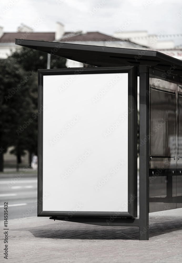 Blank billboard at the bus stop. Street blank poster. Isolated with clipping path. Selective focus. Blank billboard at the bus stop. Street blank poster. Isolated with clipping path. Selective focus.