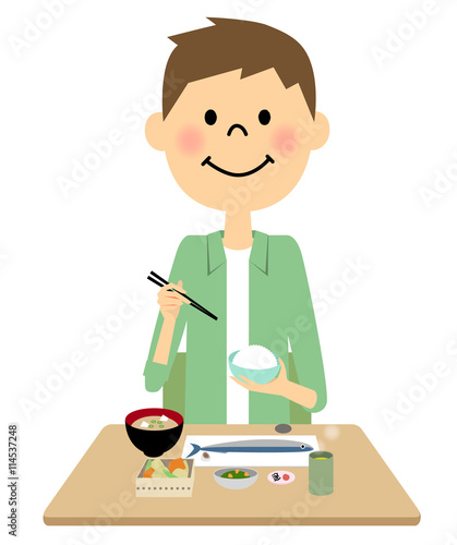 ご飯を食べる男性