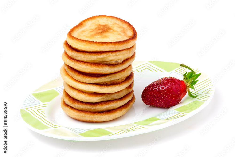 fritters on a plate with strawberries isolated white background