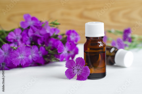 Small bottle of natural cosmetic (essential) aroma oil 