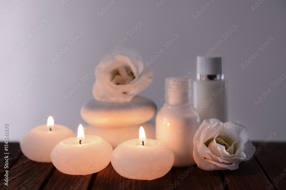 Spa composition with candles on dark background Spa composition with candles on dark background
