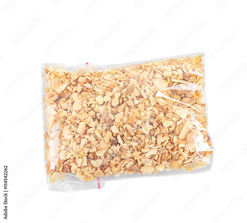 Dried chopped garlic in plastic zipper bag, isolated on white Dried chopped garlic in plastic zipper bag, isolated on white