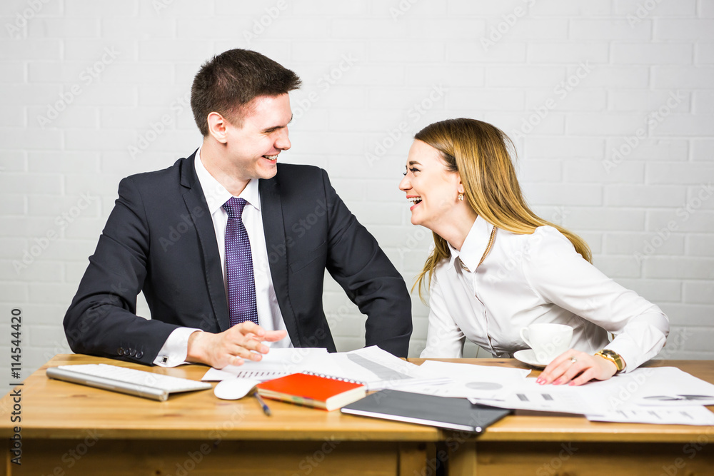 funny businessman telling a joke during conference coffee break funny businessman telling a joke during conference coffee break