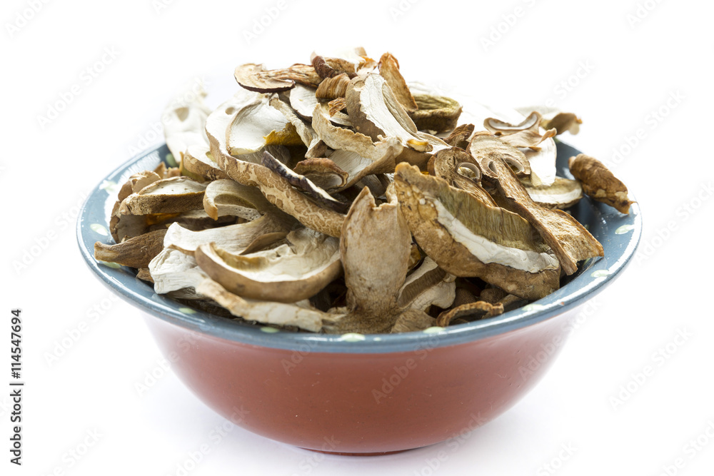 Dried boletus mushrooms in bowl