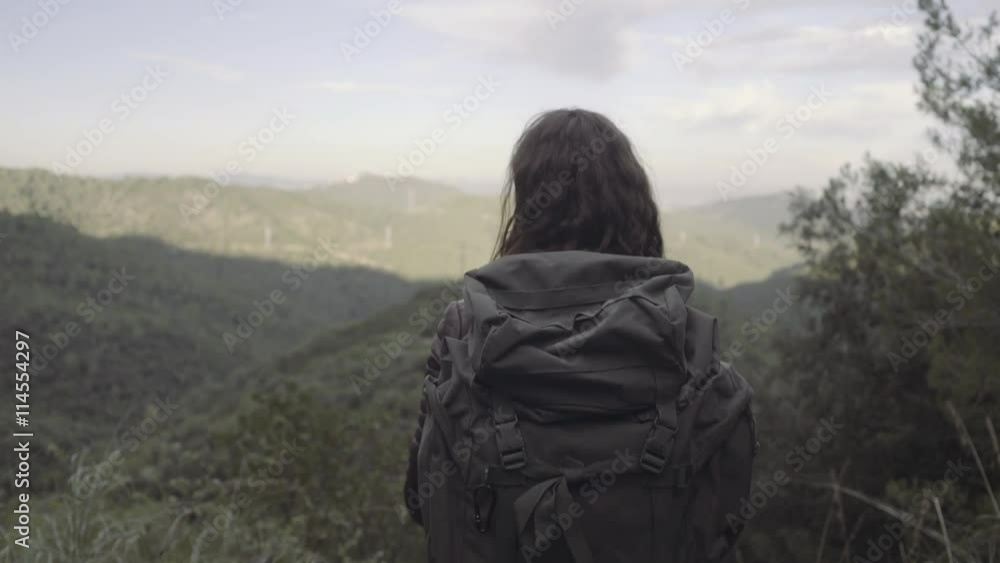 Young Adult Female admiring mountain views Young Adult Female admiring mountain views