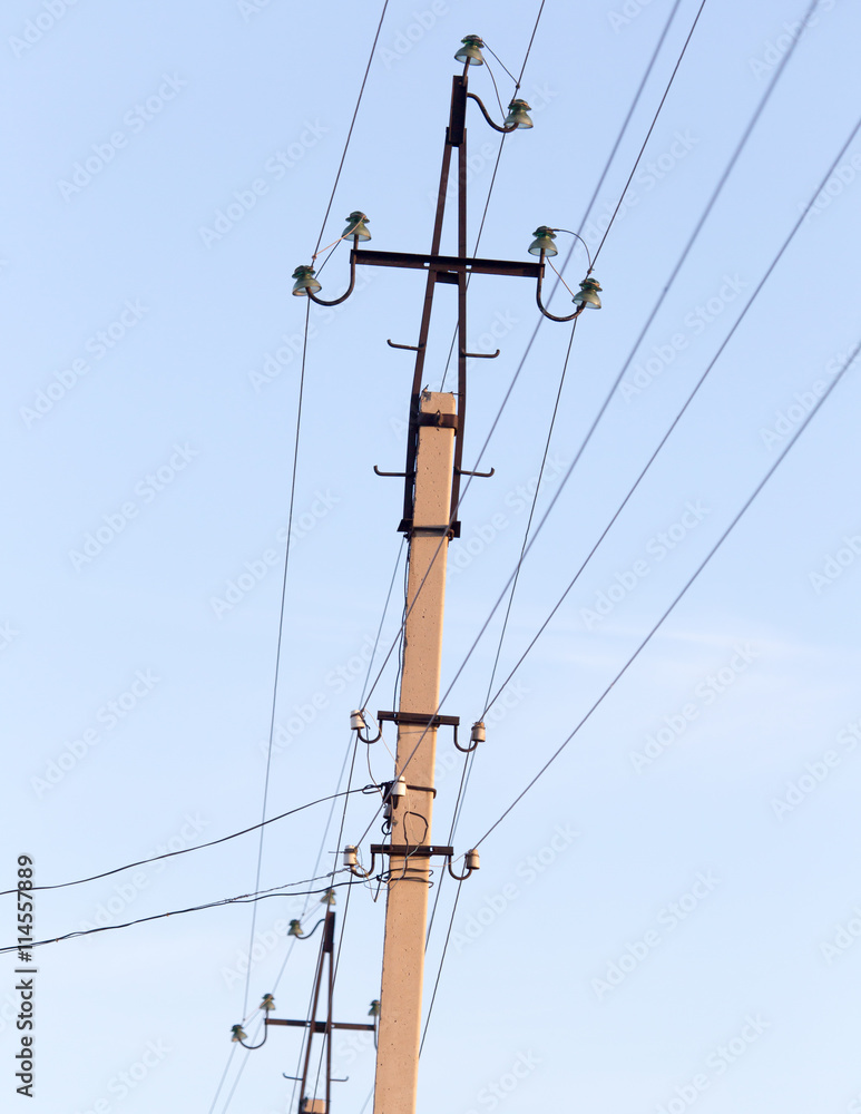 Mast electrical power line against cloud and blue sky Mast electrical power line against cloud and blue sky