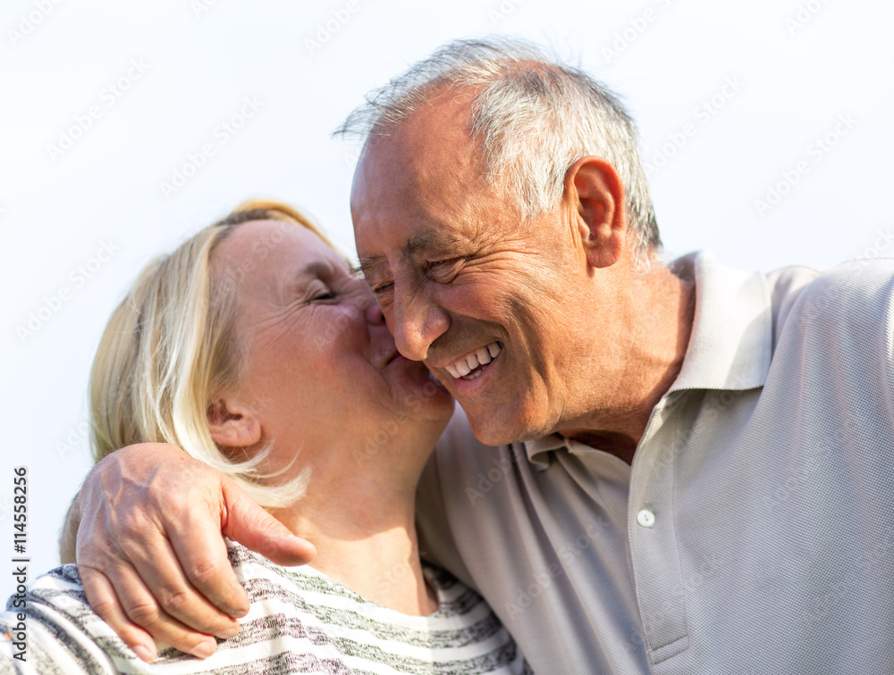 Senior couple embracing each other. Senior couple embracing each other.
