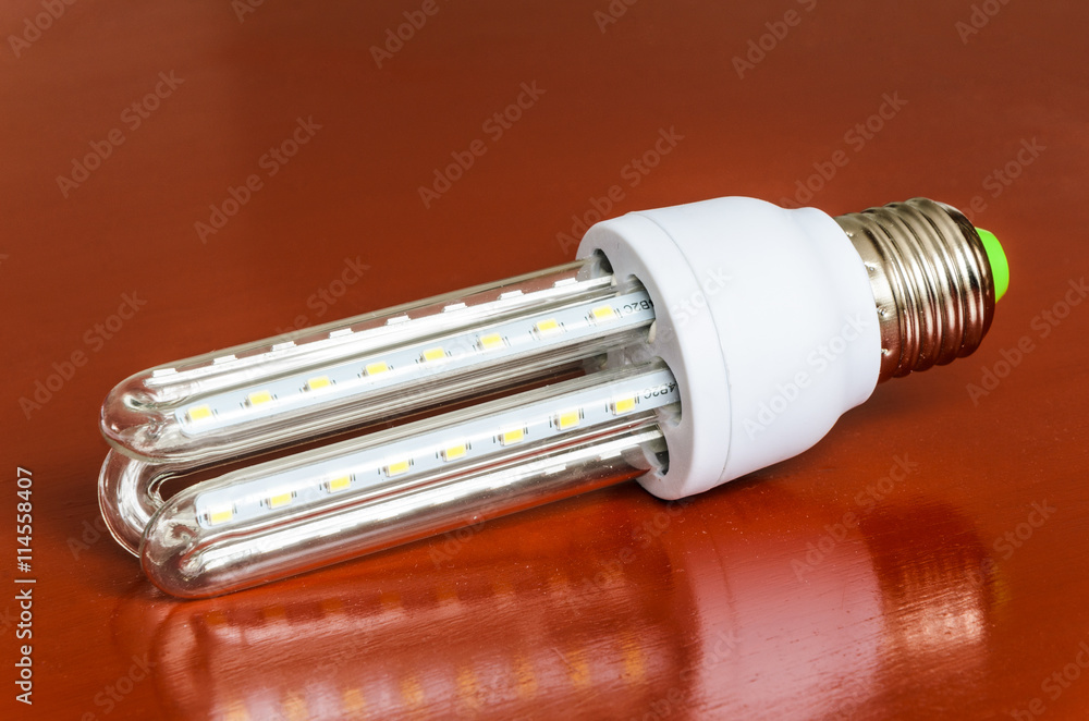 LED bulb isolated on a red background LED bulb isolated on a red background