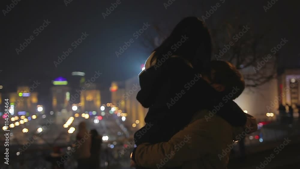 Happy young man in love hugging girlfriend as she says yes to marriage proposal Happy young man in love hugging girlfriend as she says yes to marriage proposal