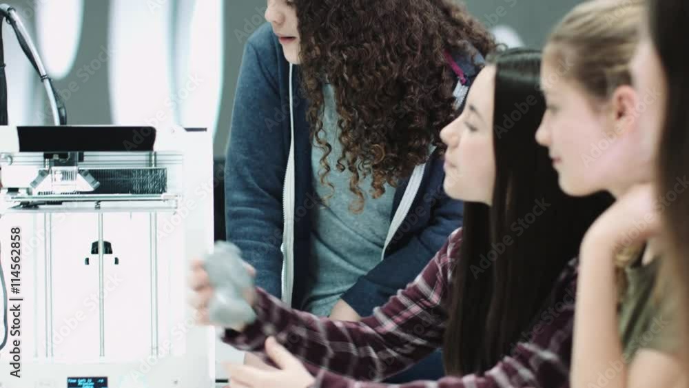 Female Children working with 3D printer Female Children working with 3D printer