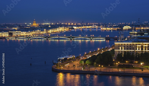 Evening view from the Neva river to St. Isaac s Cathedral and the Bridge
