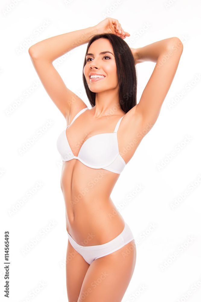 Pretty healthy slim young woman showing her white lingerie Pretty healthy slim young woman showing her white lingerie