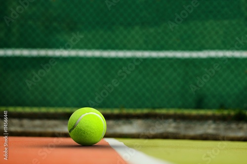 Composite image of tennis ball with a syringe © vectorfusionart