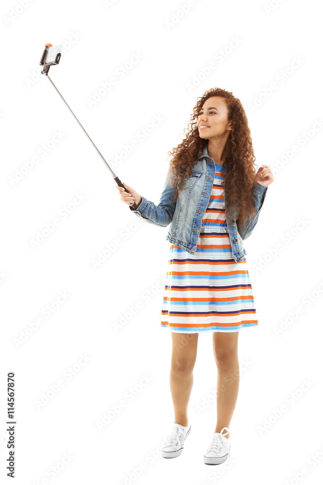 Young attractive woman taking selfie isolated on white Young attractive woman taking selfie isolated on white