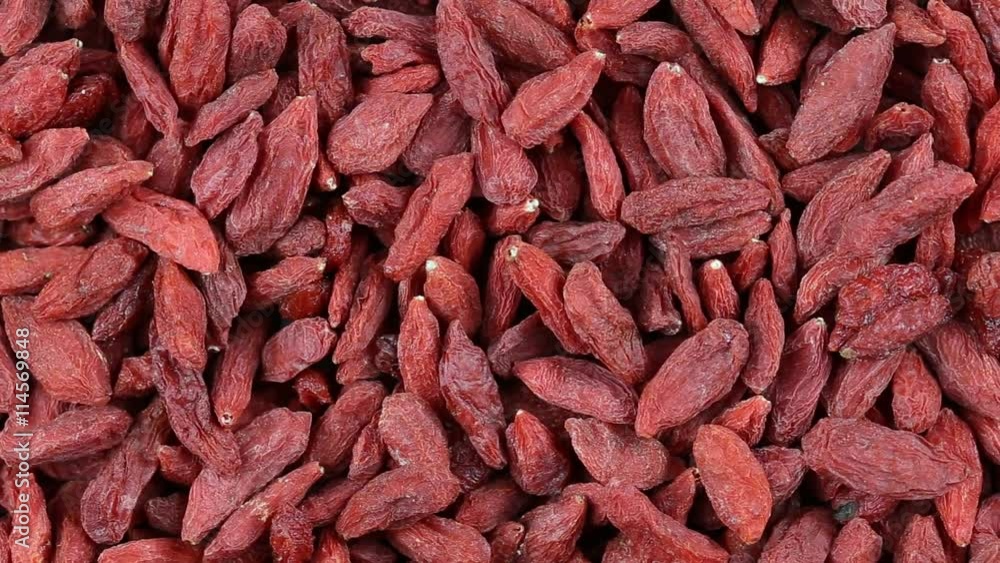 Dried Goji Berries. Loop rotation. Front of the camera rotates plate with bright berries Goji. Close up Dried Goji Berries. Loop rotation. Front of the camera rotates plate with bright berries Goji. Close up