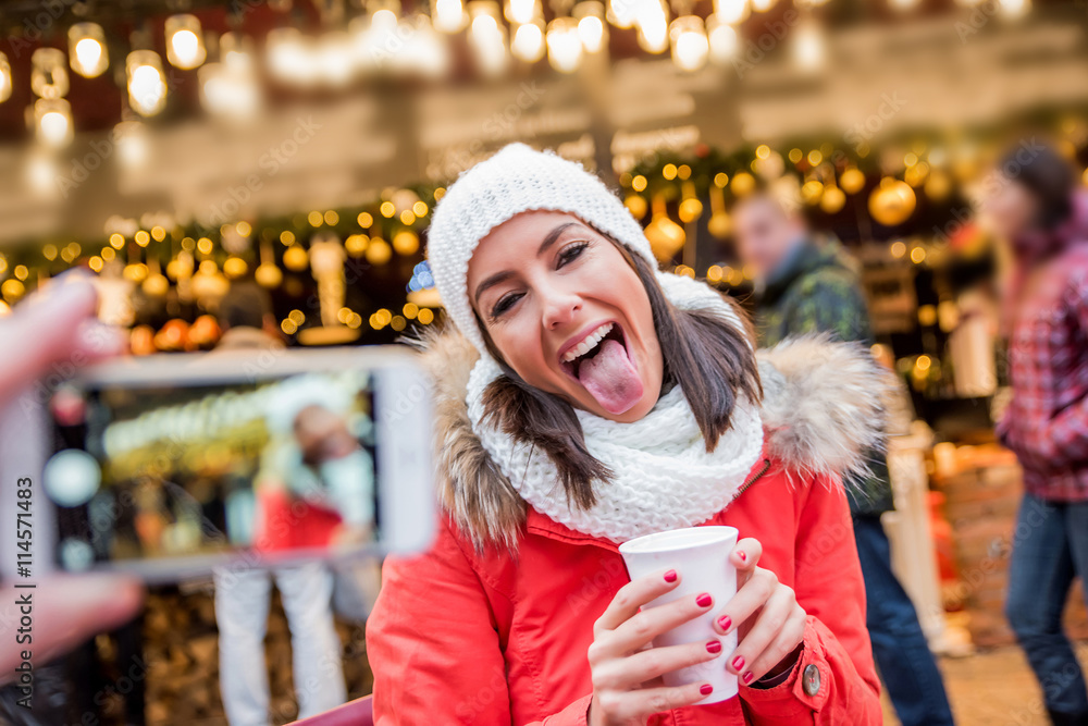 Young woman on the christmas market