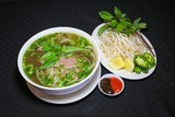 Bun bo or Vietnamese vermicelli noodle soup with minced beef