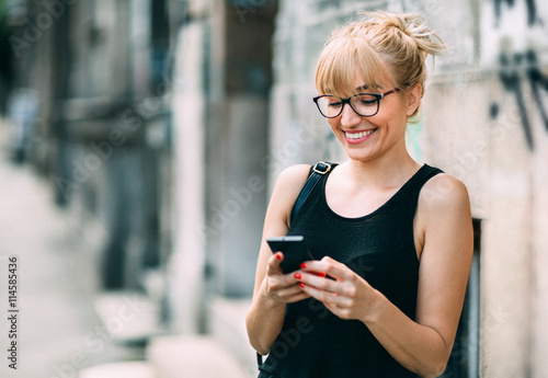 Beautiful girl texting