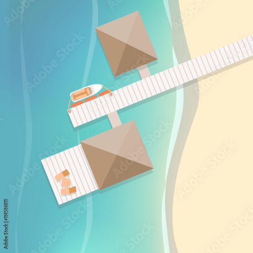 Top view tropical beach with white wooden pier and two bungalows