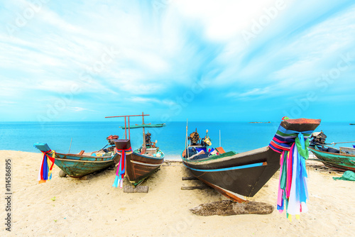 Longtail boat on tropical beach