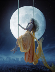 Leinwandbilder Artist KB Elegante Frau vor großem Mond  © konradbak