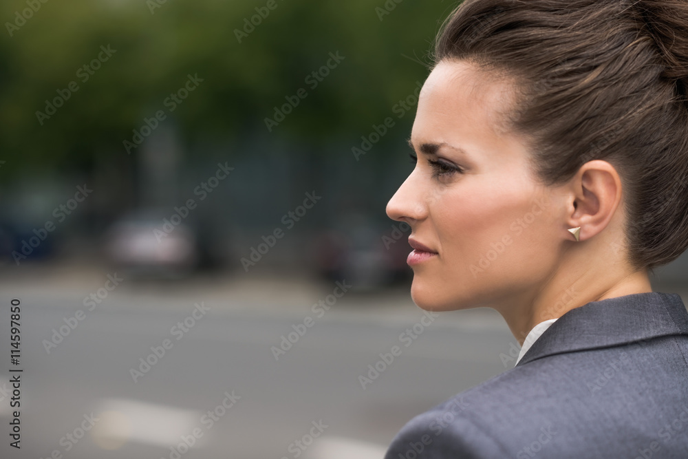 Profile portrait of pensive business woman at office district Profile portrait of pensive business woman at office district