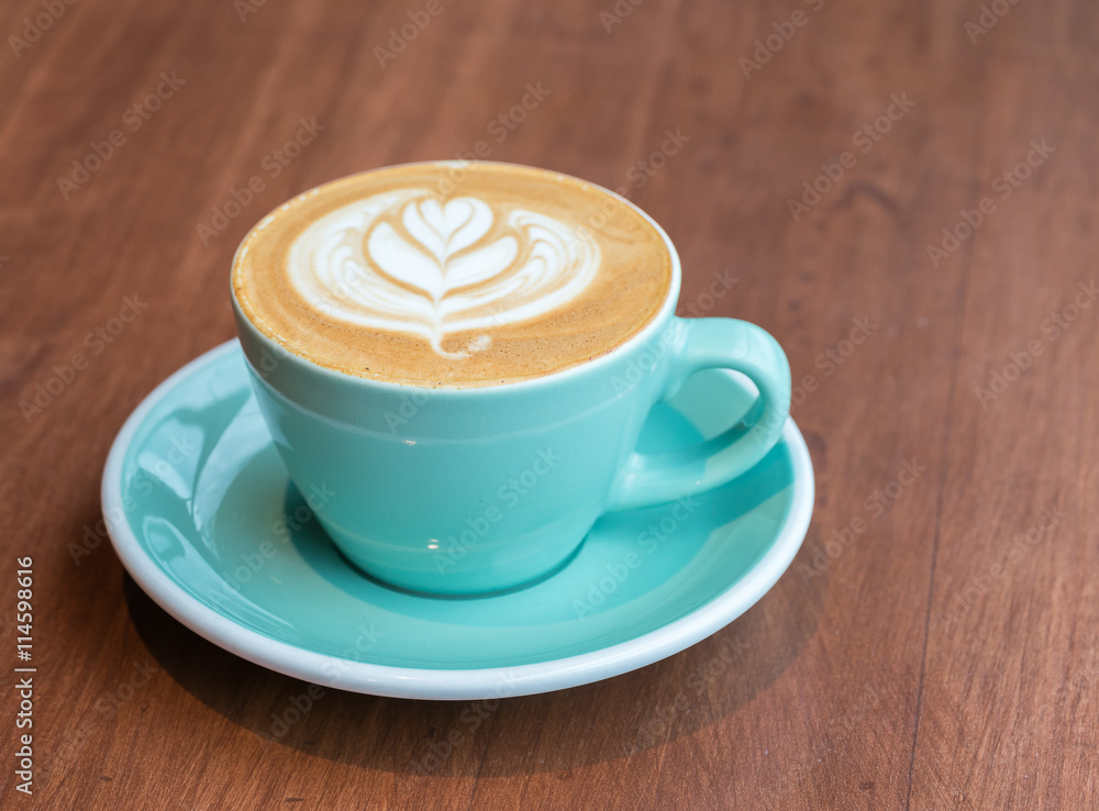 cup of coffee on wood table
cup of coffee on wood table